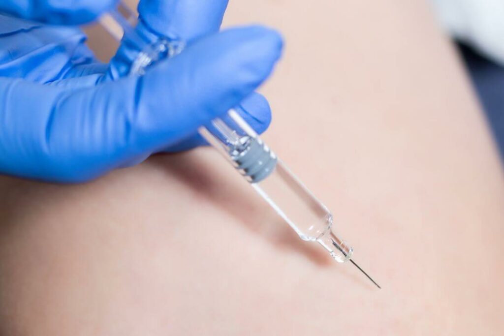 Close up of a prolozone injection in the knee